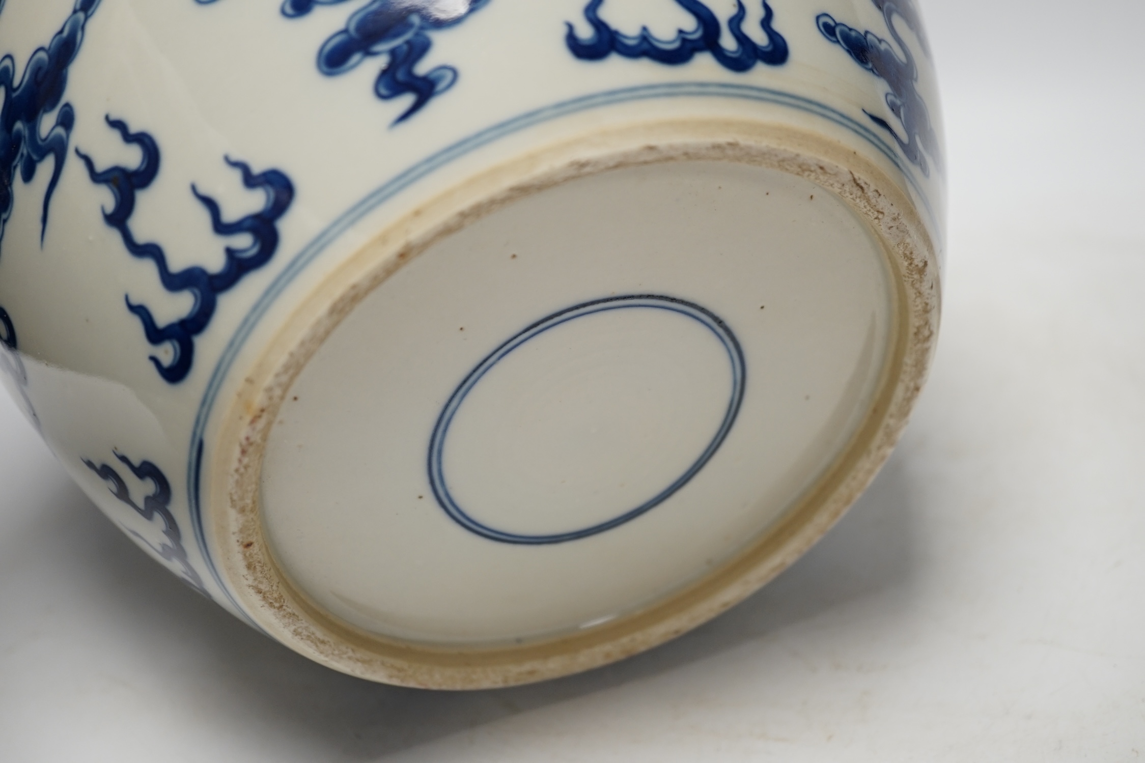 A large Chinese blue and white ‘dragon’ ginger jar and cover, 32cm